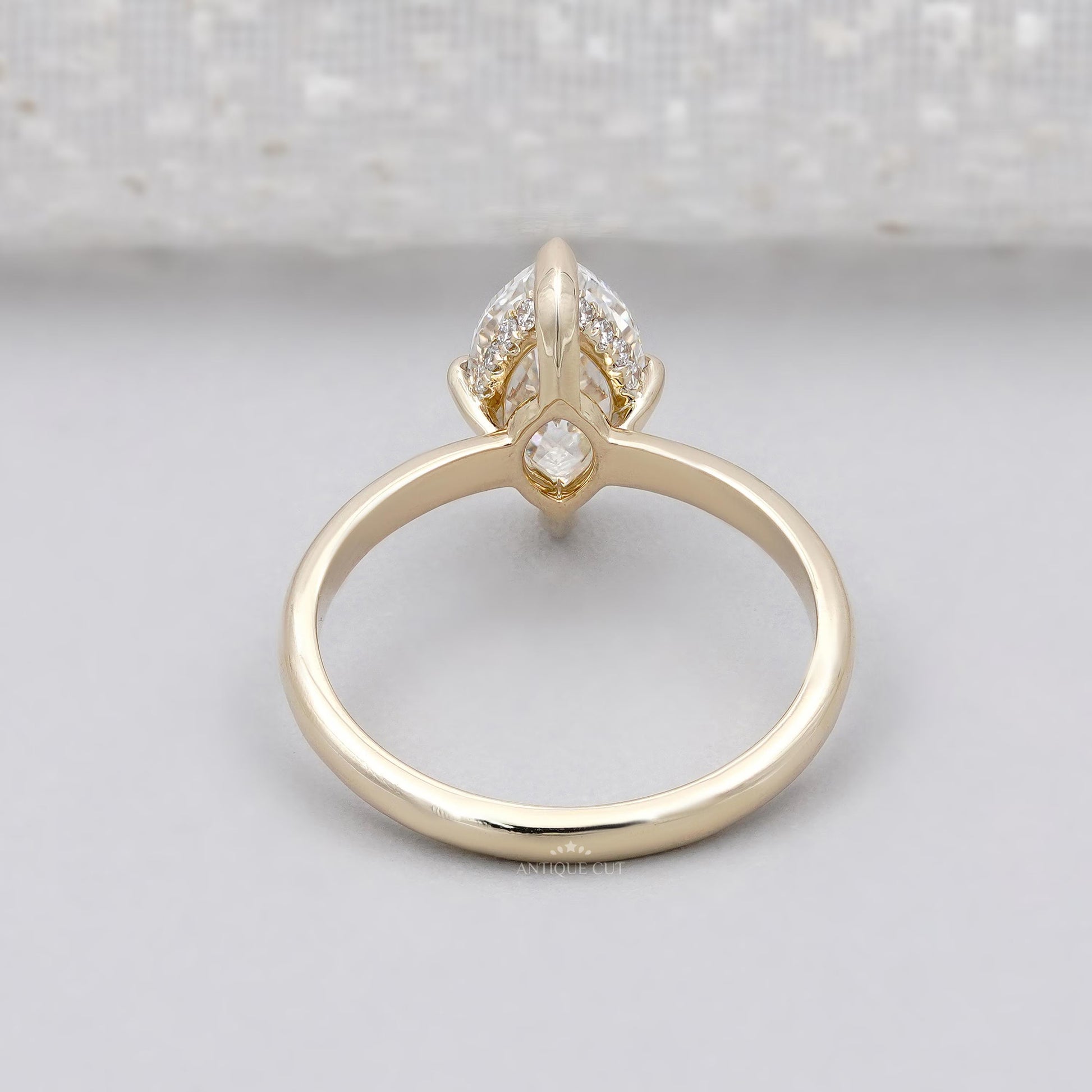 Gold ring with a marquise-shaped diamond
