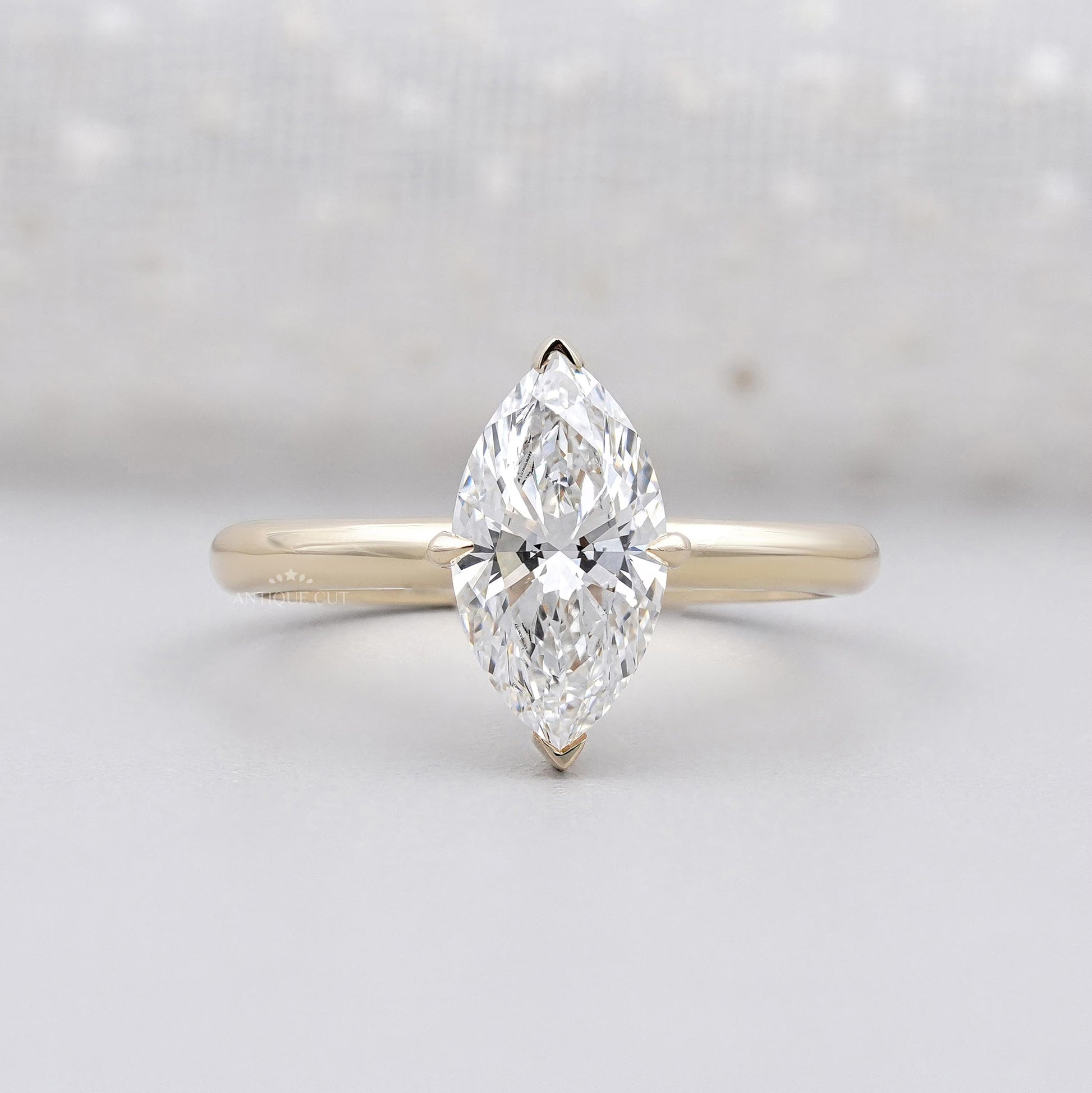 Marquise Cut Diamond Engagement Ring with Hidden Halo