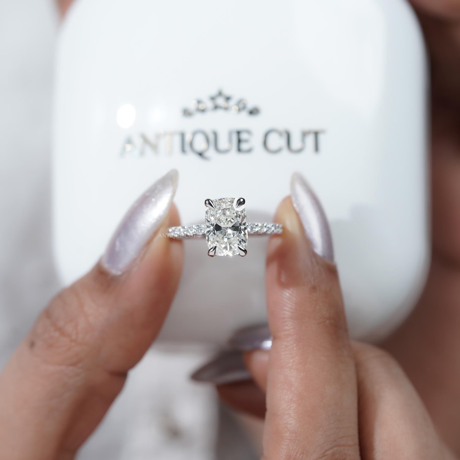 Cushion diamond ring with micro pave band
