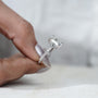 Elegant cushion diamond ring with 4 prong setting