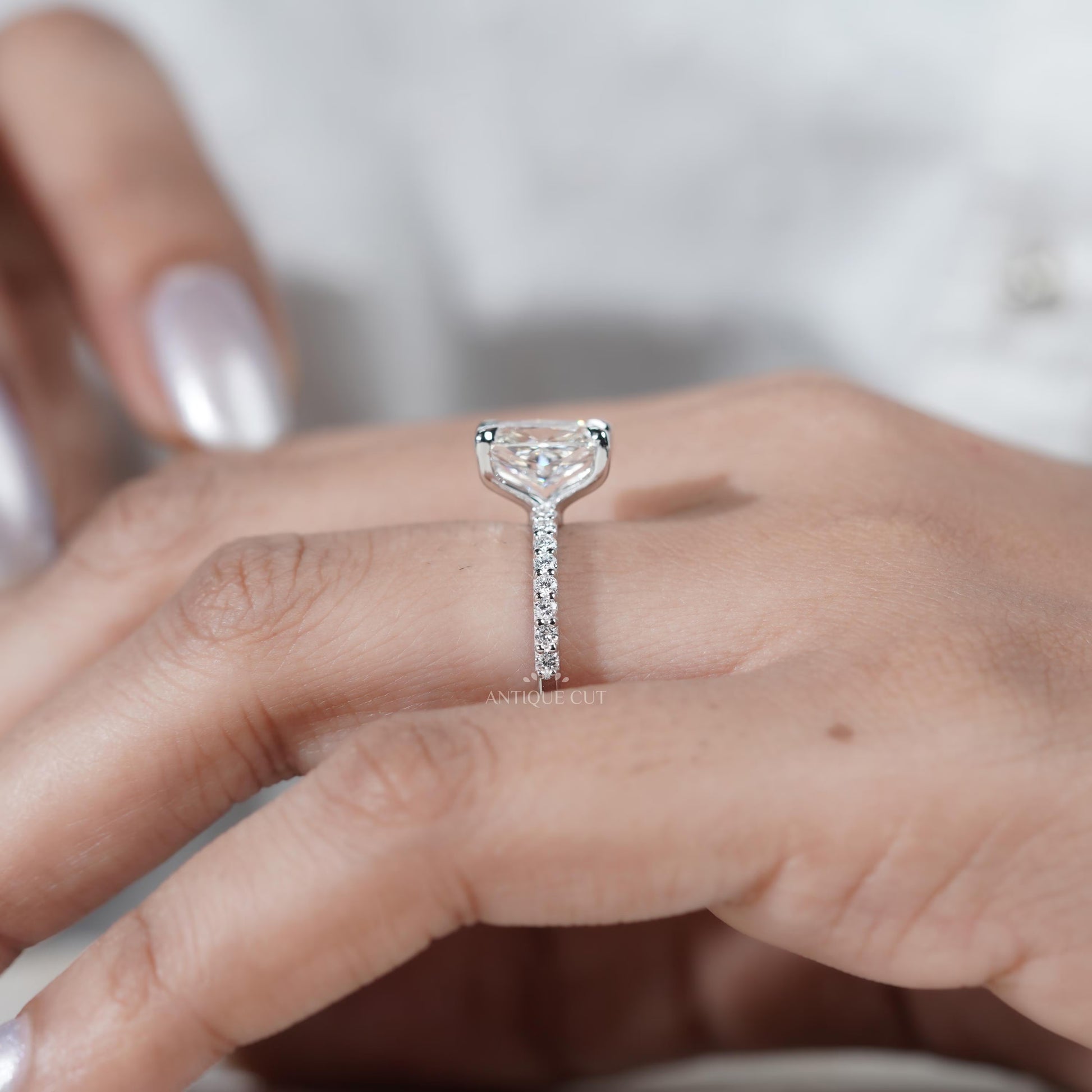 Elegant cushion diamond ring with 4 prong setting