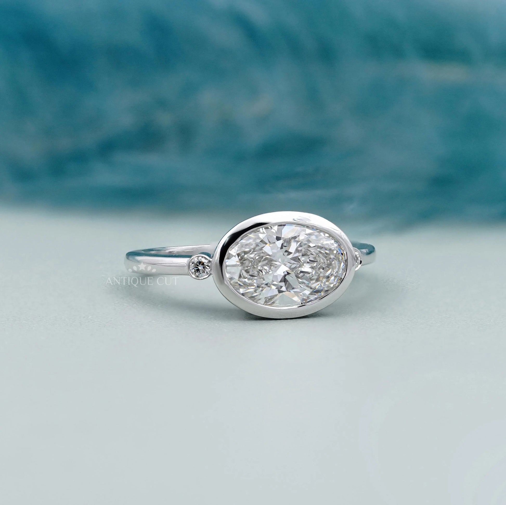 East West Oval Engagement Ring With Bezel Setting | Lab Grown Diamond