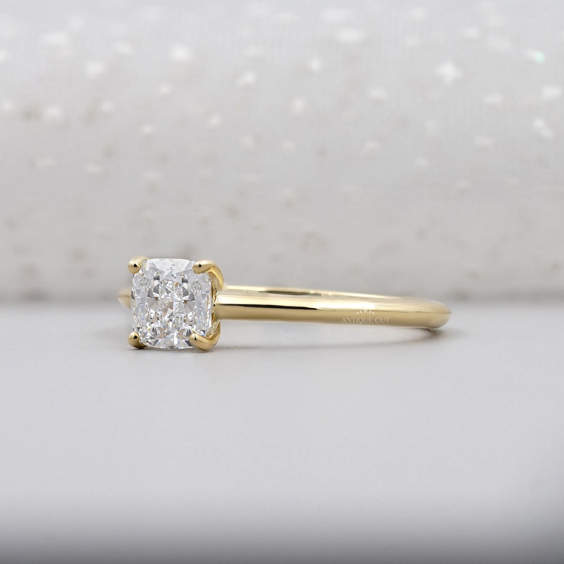 Antiquecut cushion cut diamond ring with unique hidden detail
