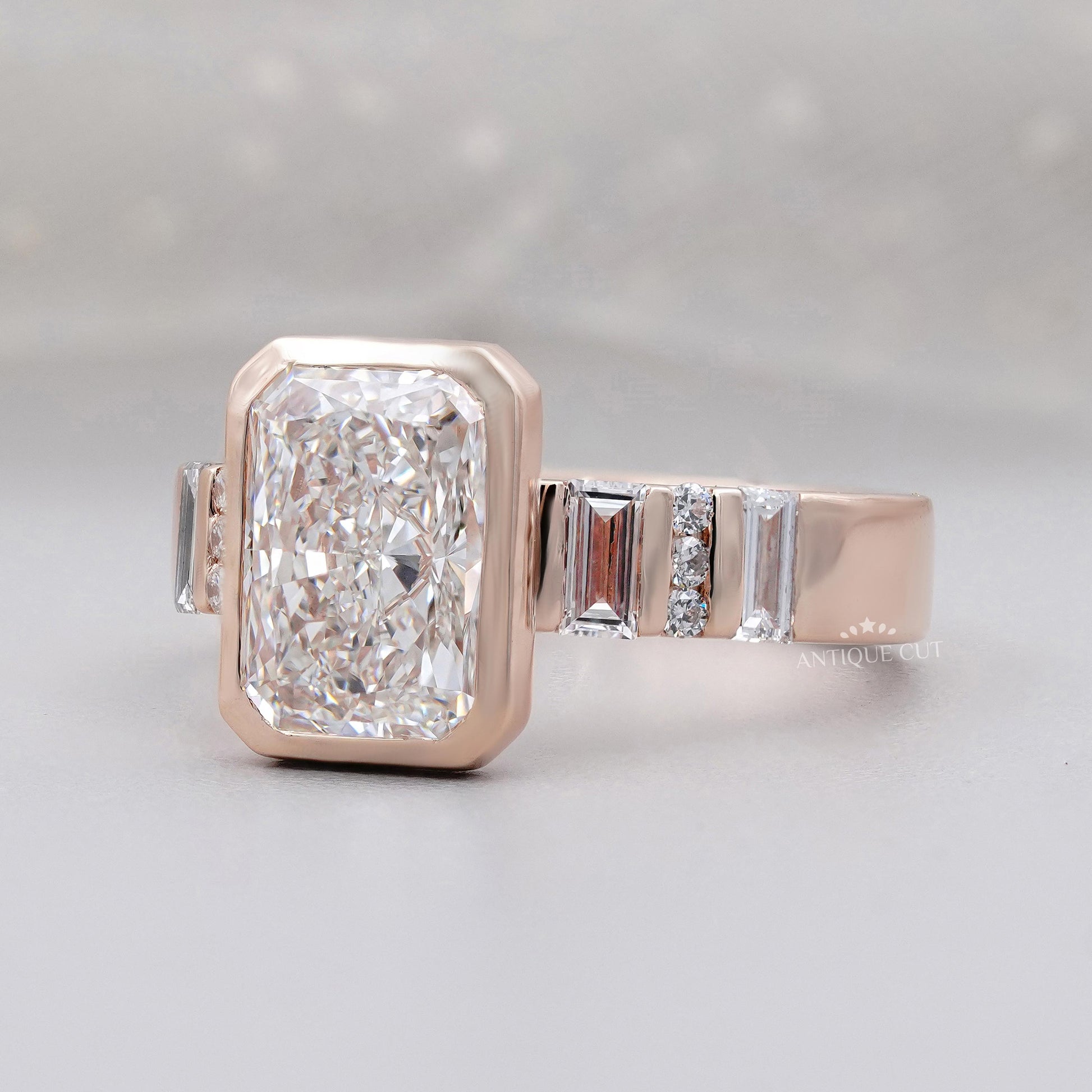 Elegant radiant cut ring with side stones