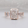 Radiant cut diamond ring in rose gold metal