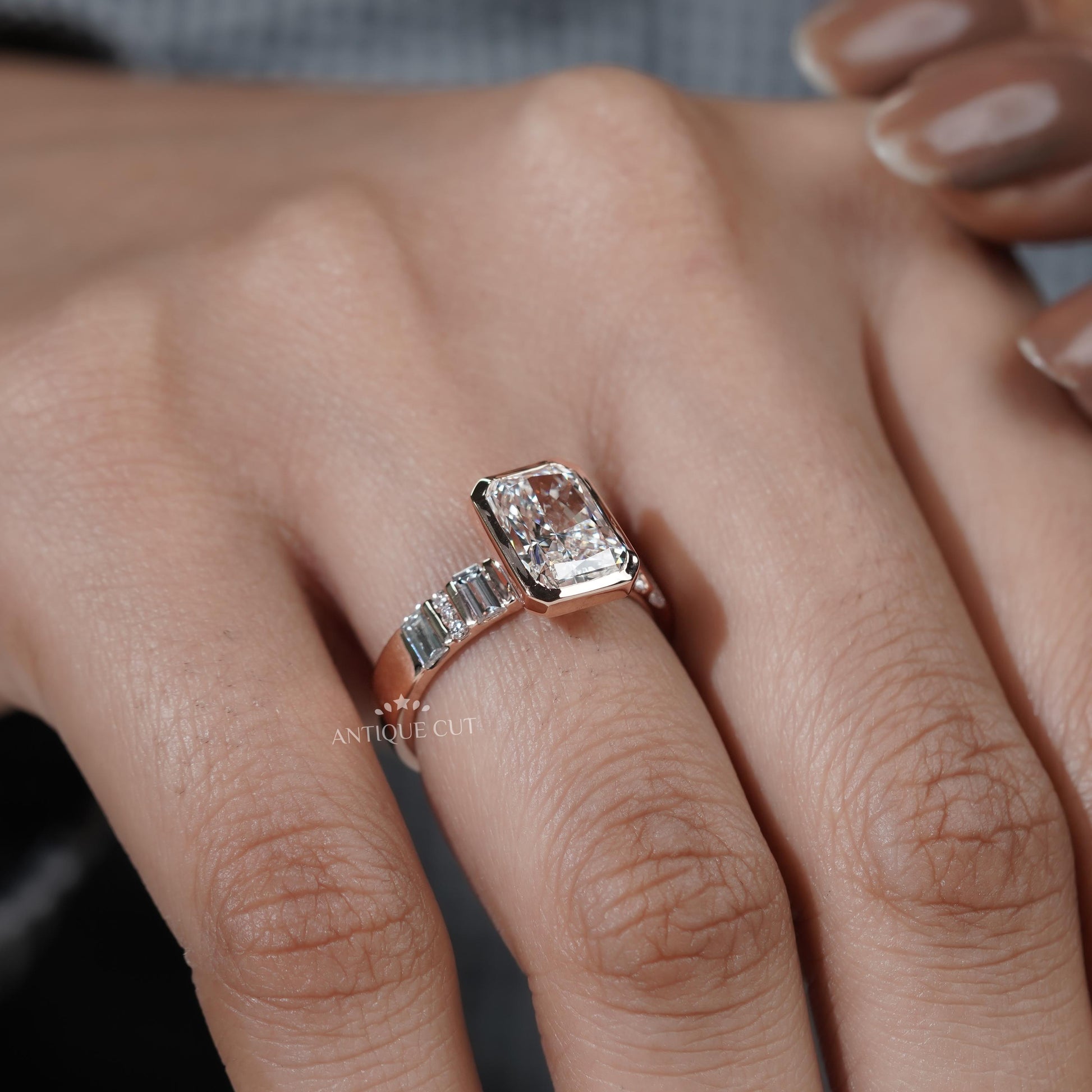 Rose gold engagement ring with bezel style
