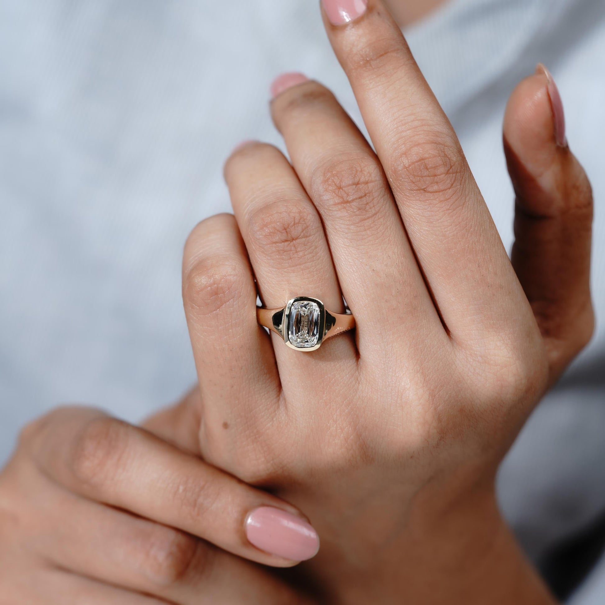 Elegant bezel set old mine elongated cushion cut ring