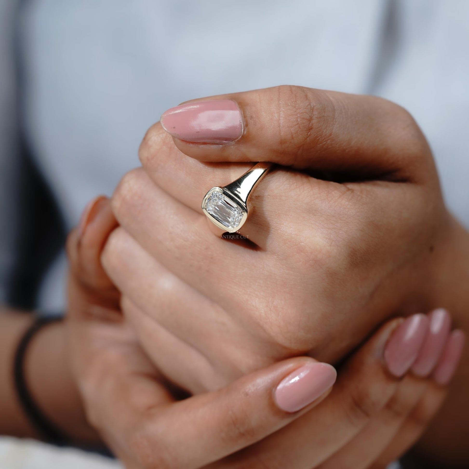 Minimalist cushion diamond ring with smooth bezel edge
