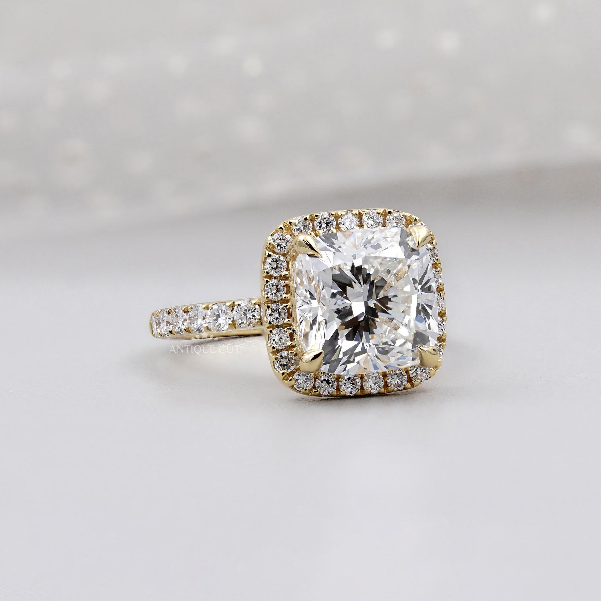 Lab grown cushion cut halo engagement ring