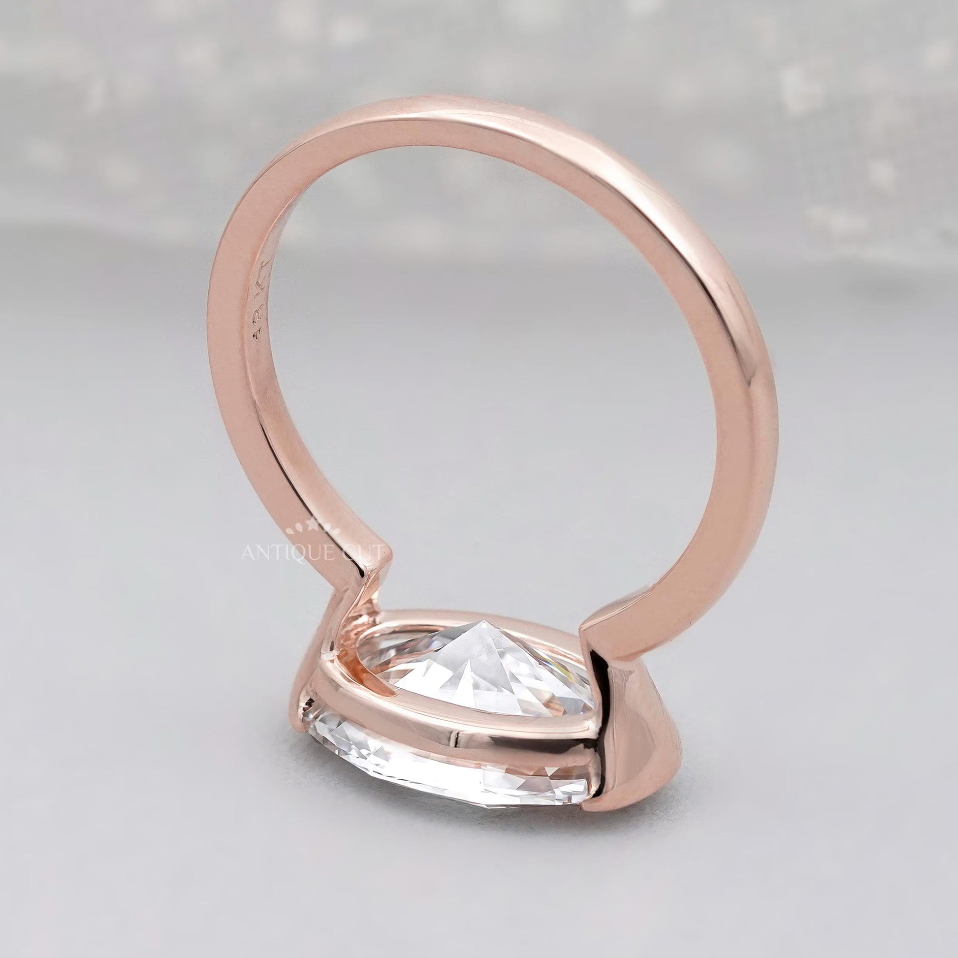 Antiquecut east west oval engagement ring