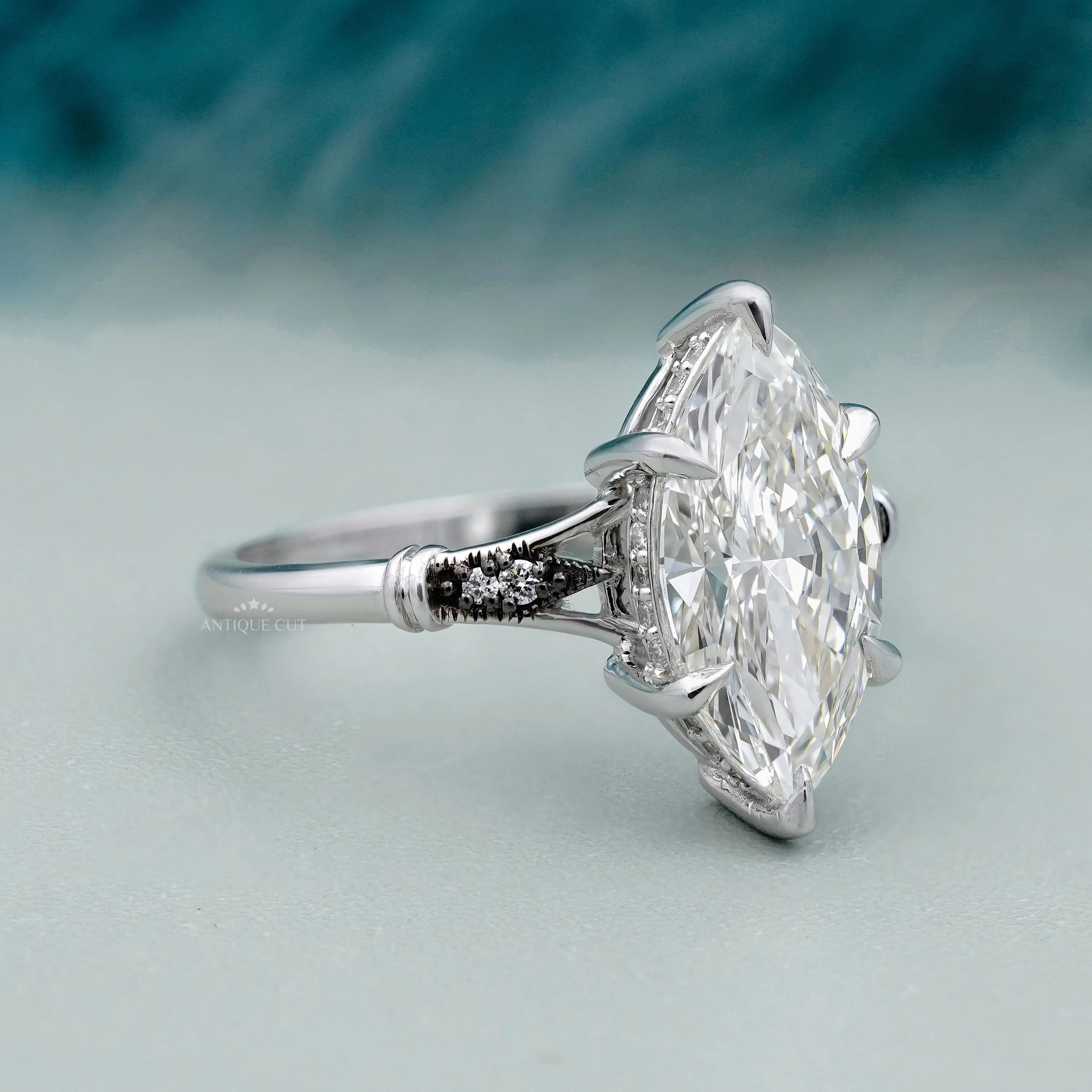 Vintage marquise engagement ring with hidden halo