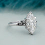 Vintage marquise engagement ring with hidden halo