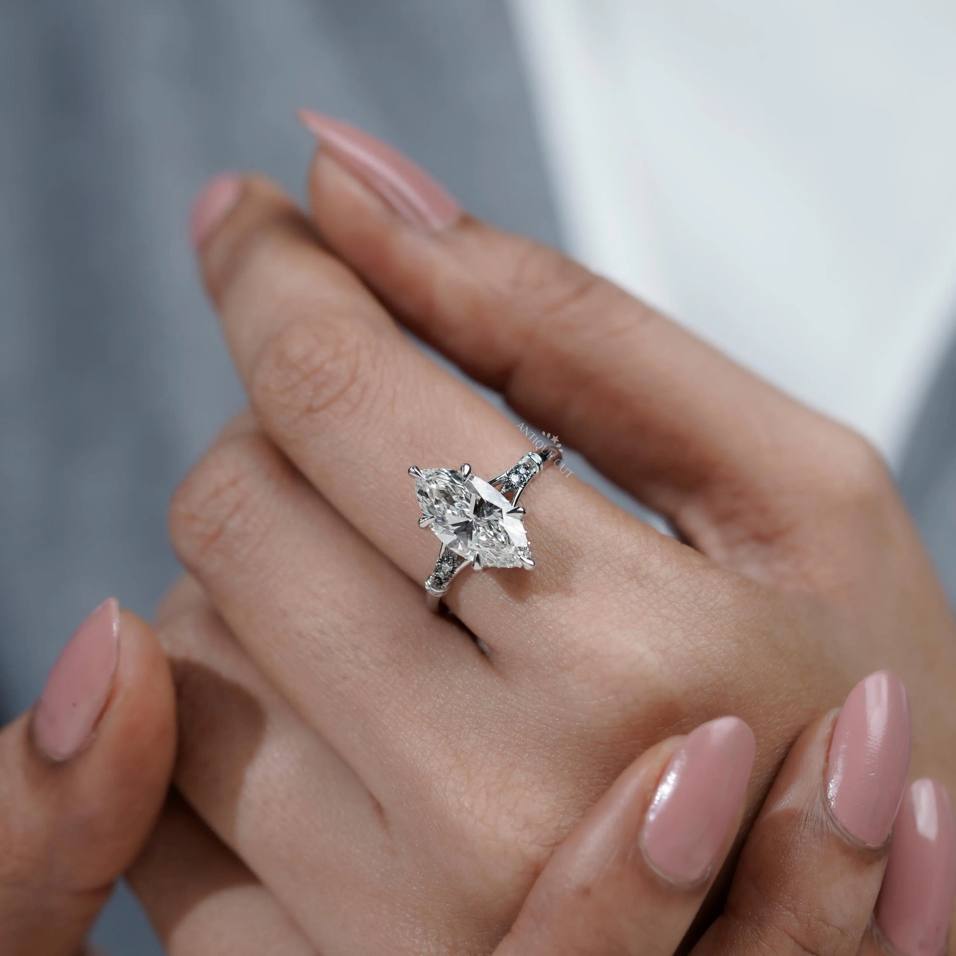 Vintage marquise engagement ring with hidden halo