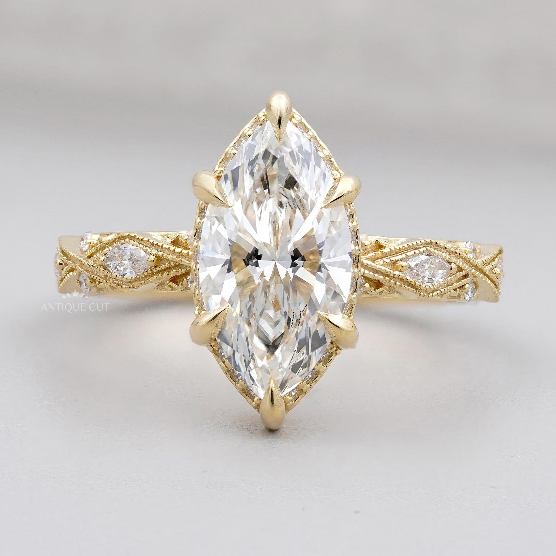 Marquise cut hidden halo vintage engagement ring