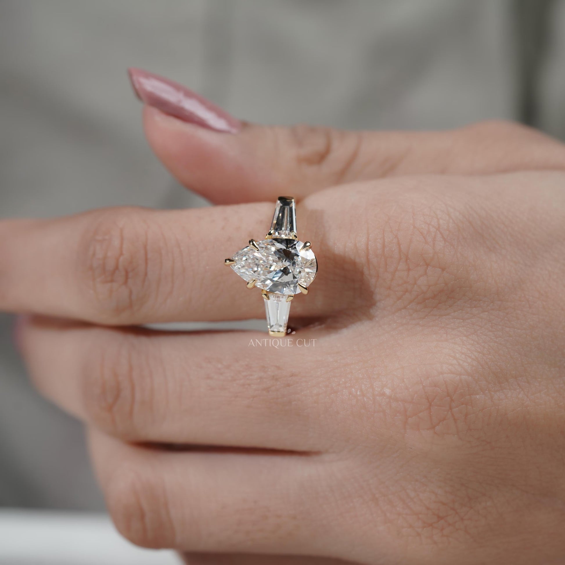 Sustainable lab grown pear engagement ring