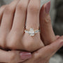 Brilliant pear diamond ring with side stones