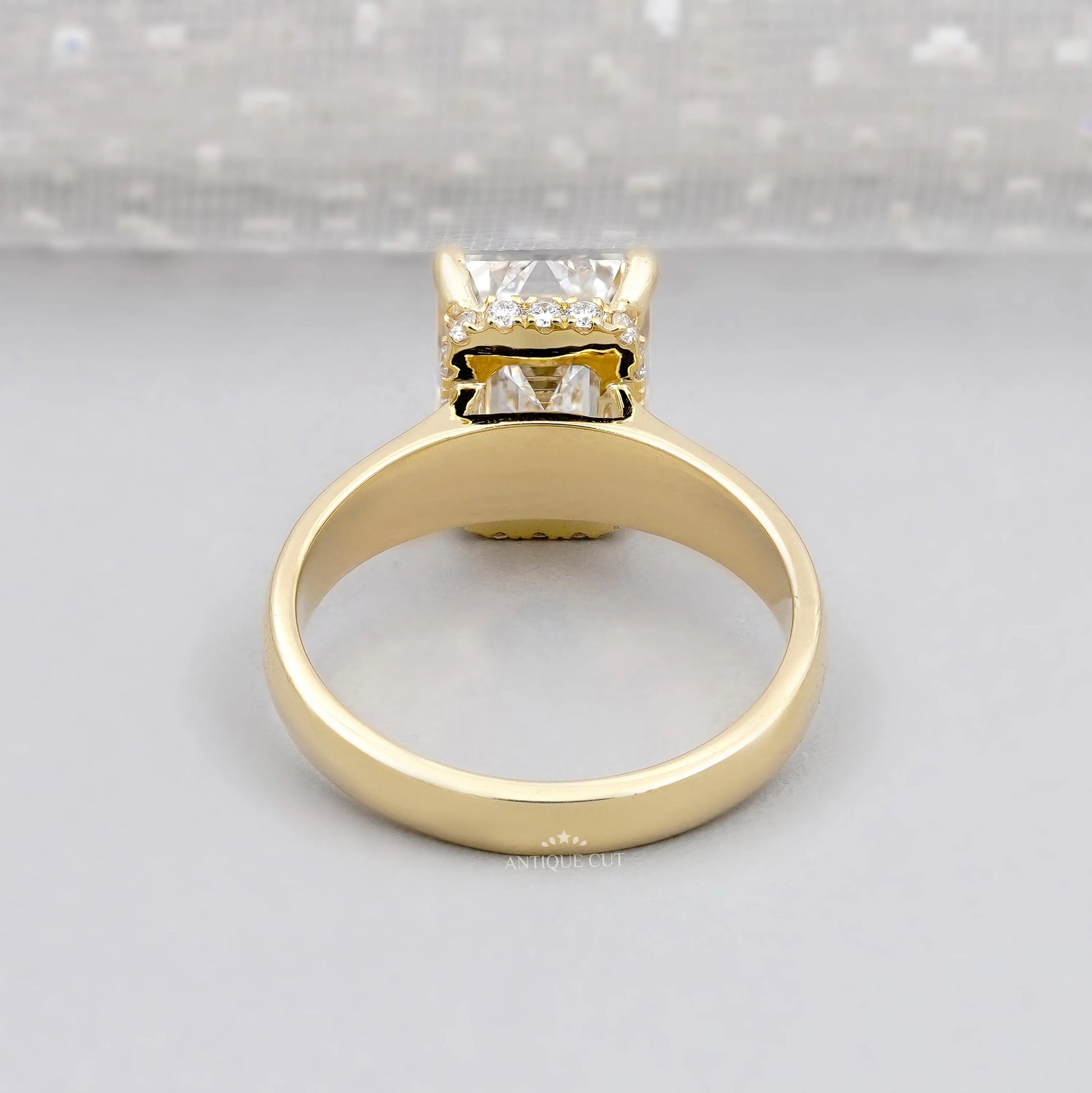 Emerald cut 4 prong diamond engagement ring
