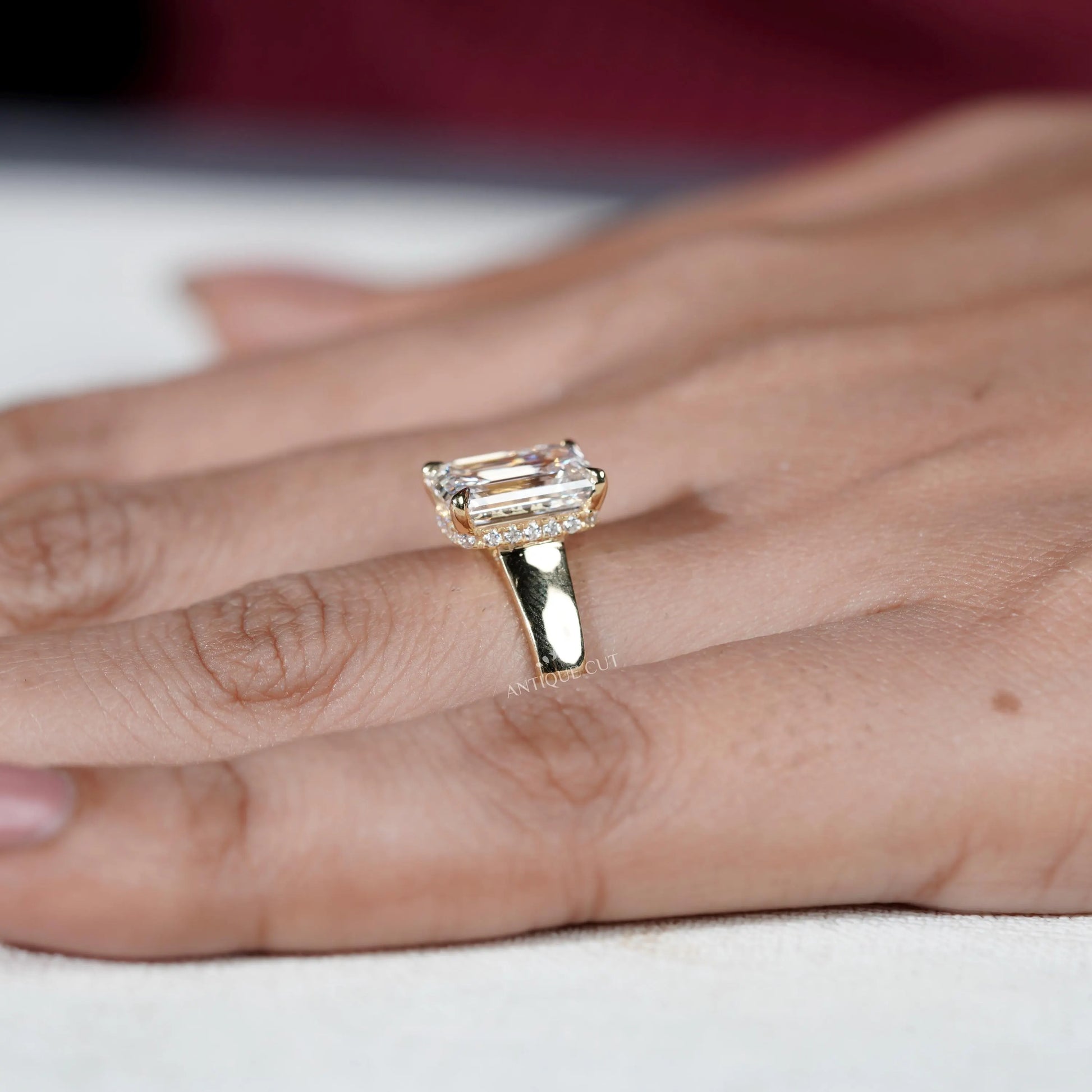 Yellow gold emerald cut engagement ring design