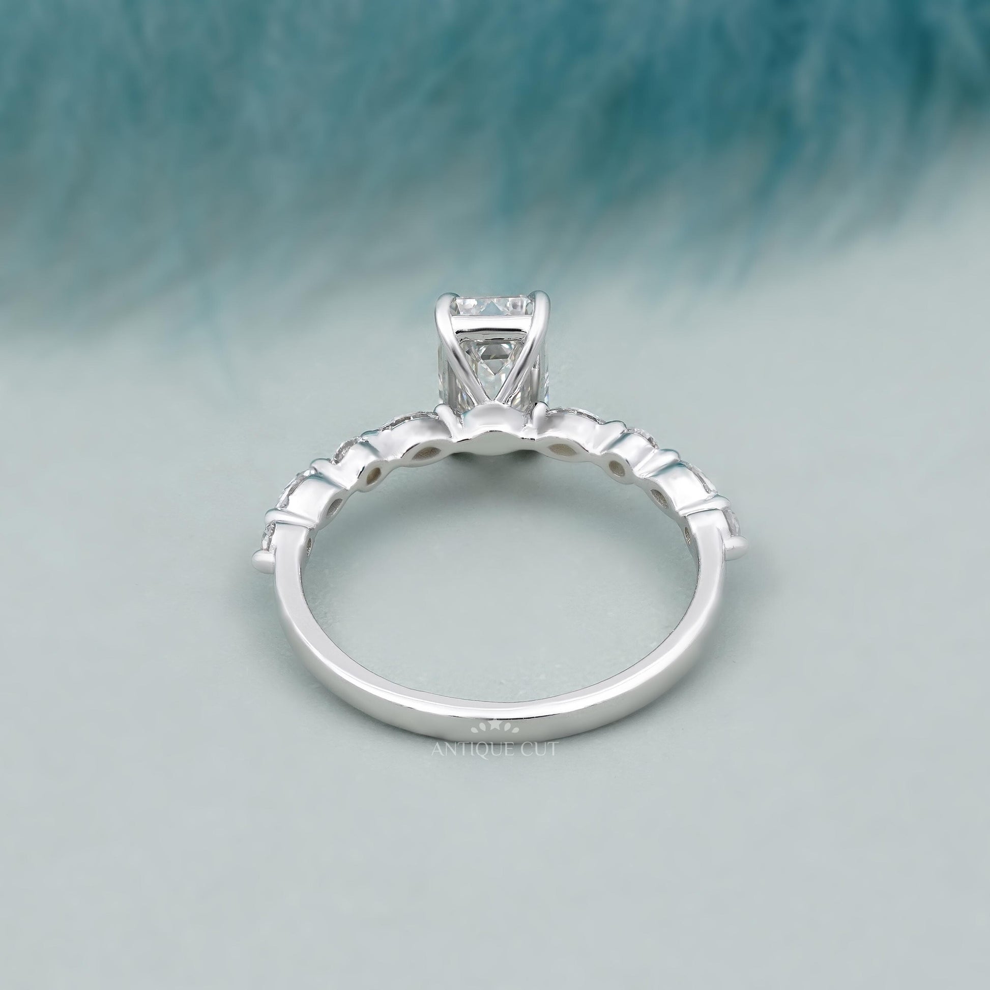 4 prong emerald cut diamond engagement ring
