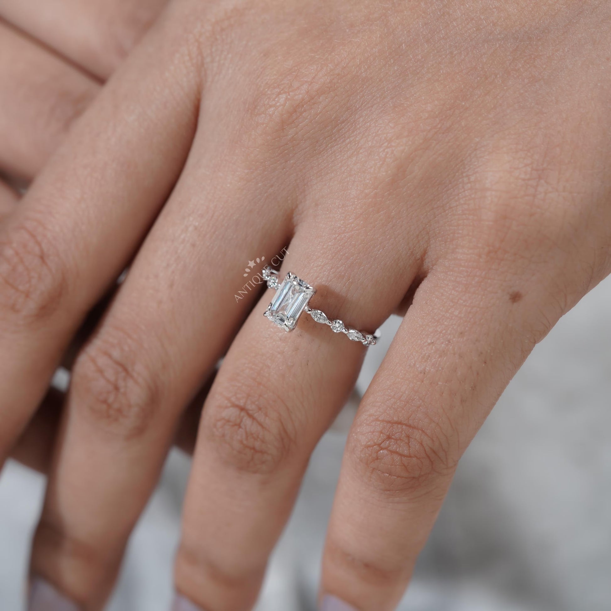 IGI certified emerald cut diamond ring in white gold
