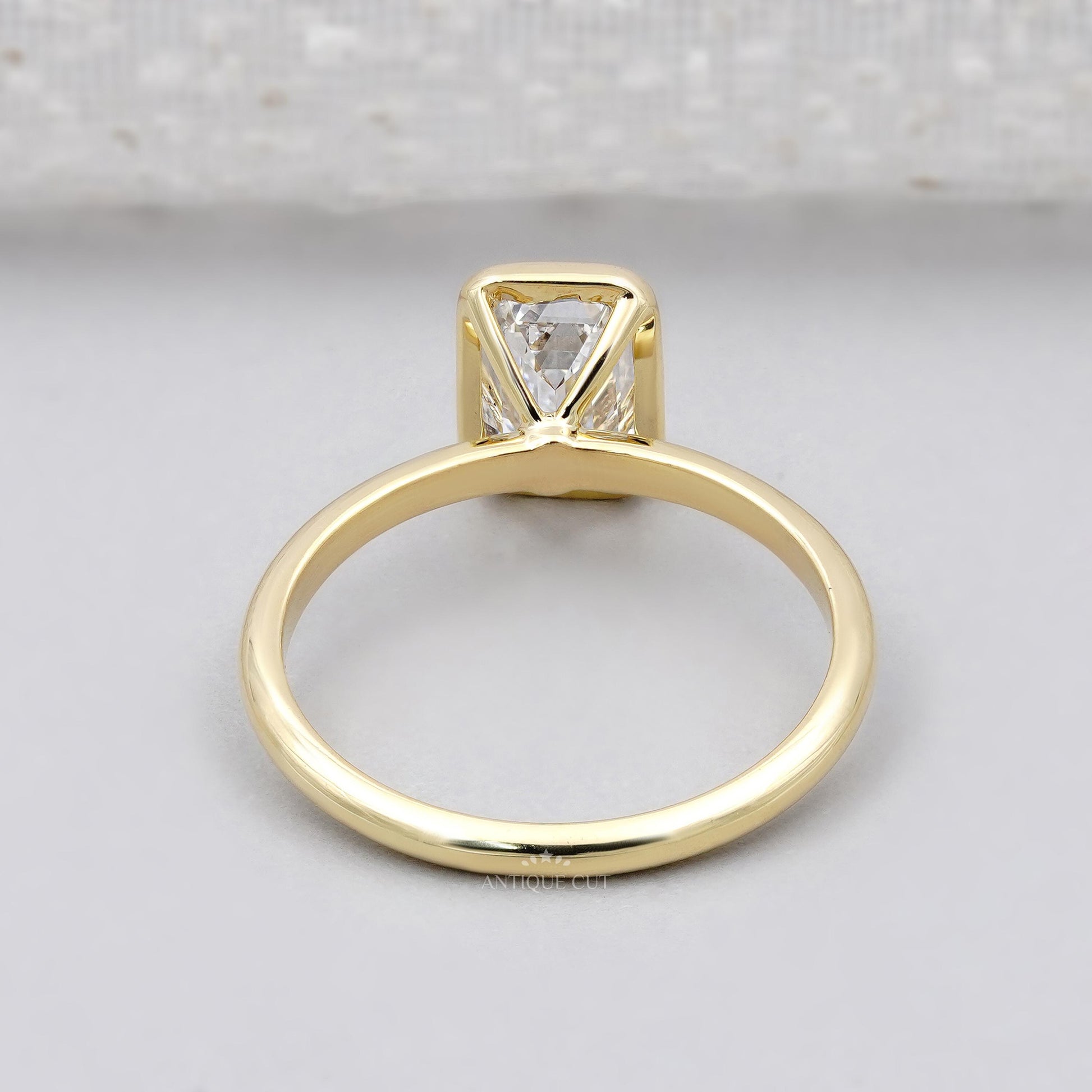 Emerald solitaire engagement ring close-up