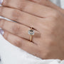 Modern emerald solitaire diamond ring
