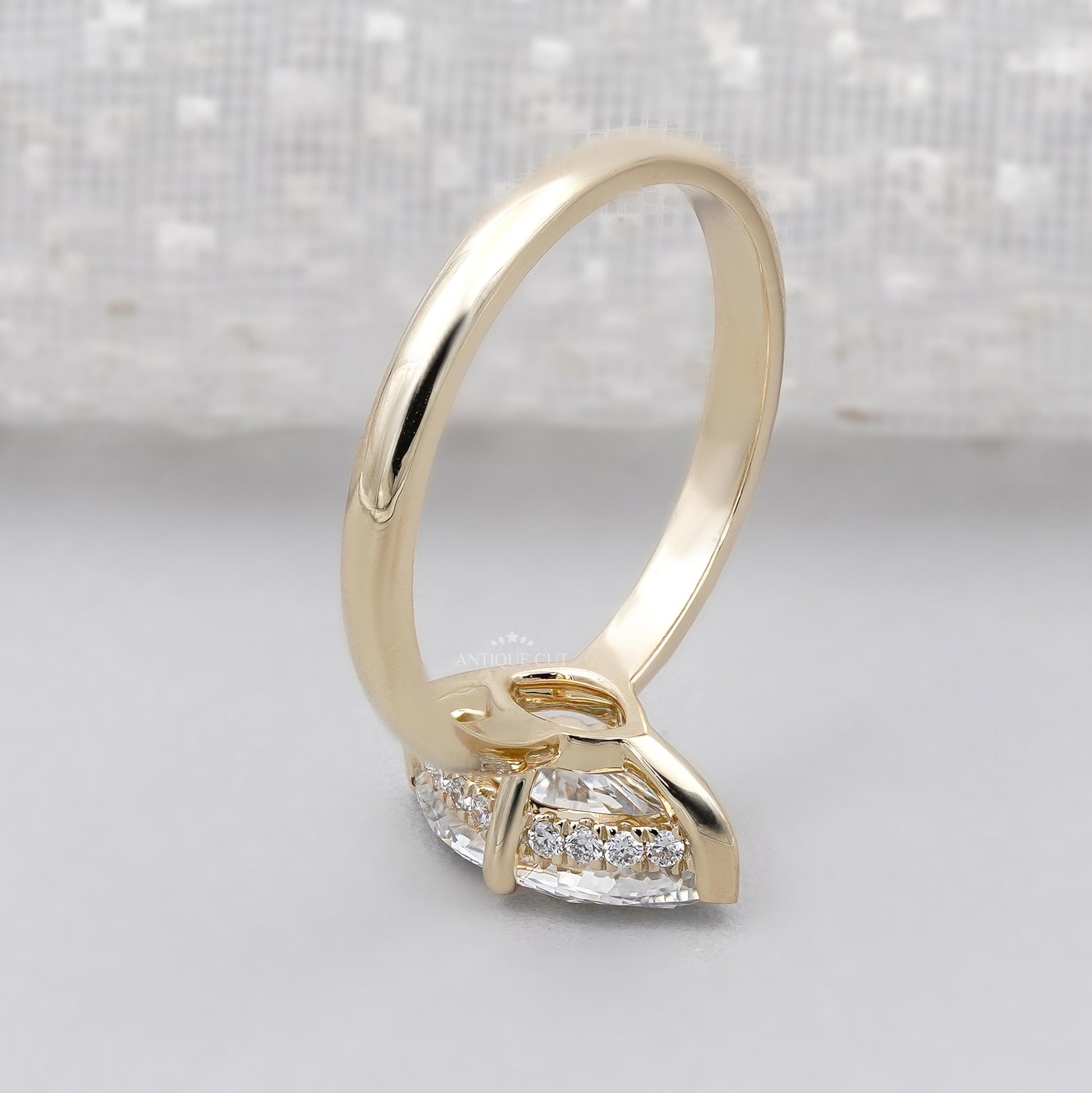 Gold ring with a marquise-shaped diamond