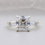 Old mine cushion cut engagement ring three stones yellow gold