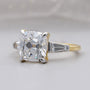 Yellow gold old mine cushion cut three stone ring
