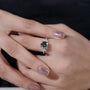 Vintage inspired round green diamond engagement ring