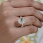 Oval Cut Diamond Engagement Ring with Hidden Halo & Marquise Side Stones