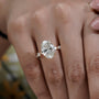Oval Cut Diamond Engagement Ring with Hidden Halo & Marquise Side Stones