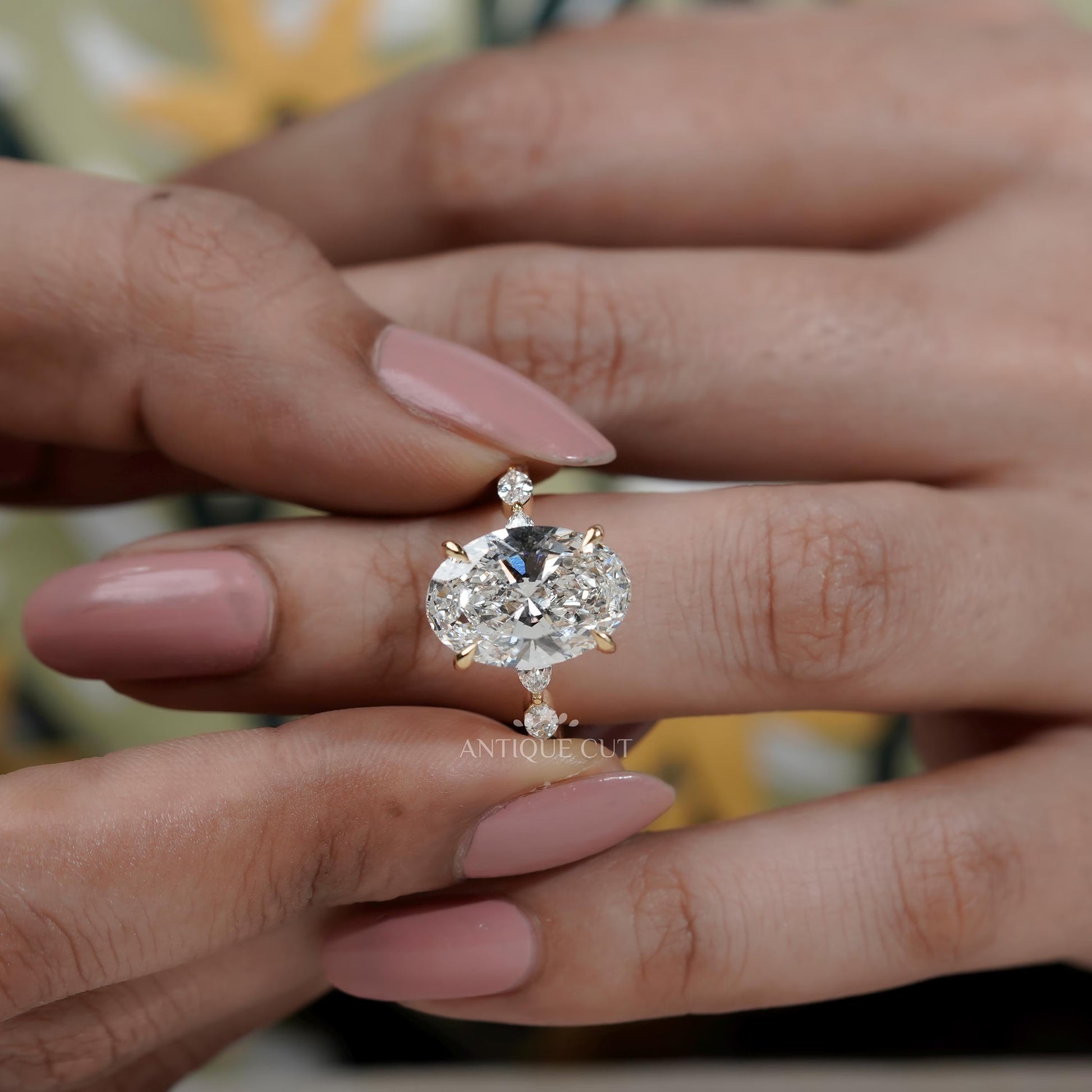 Oval Cut Diamond Engagement Ring with Hidden Halo & Marquise Side Stones