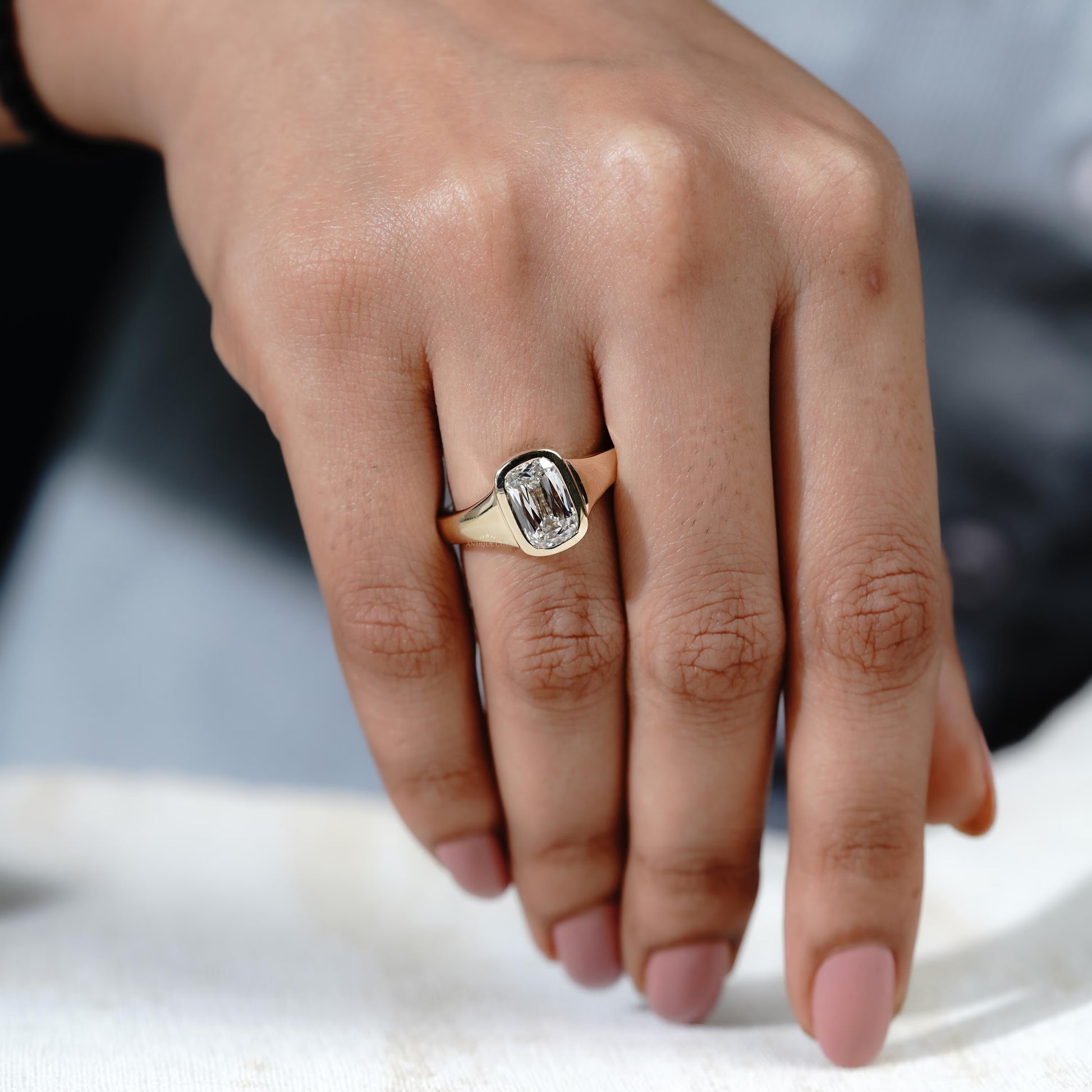 Luxury designer engagement ring with cushion cut diamond