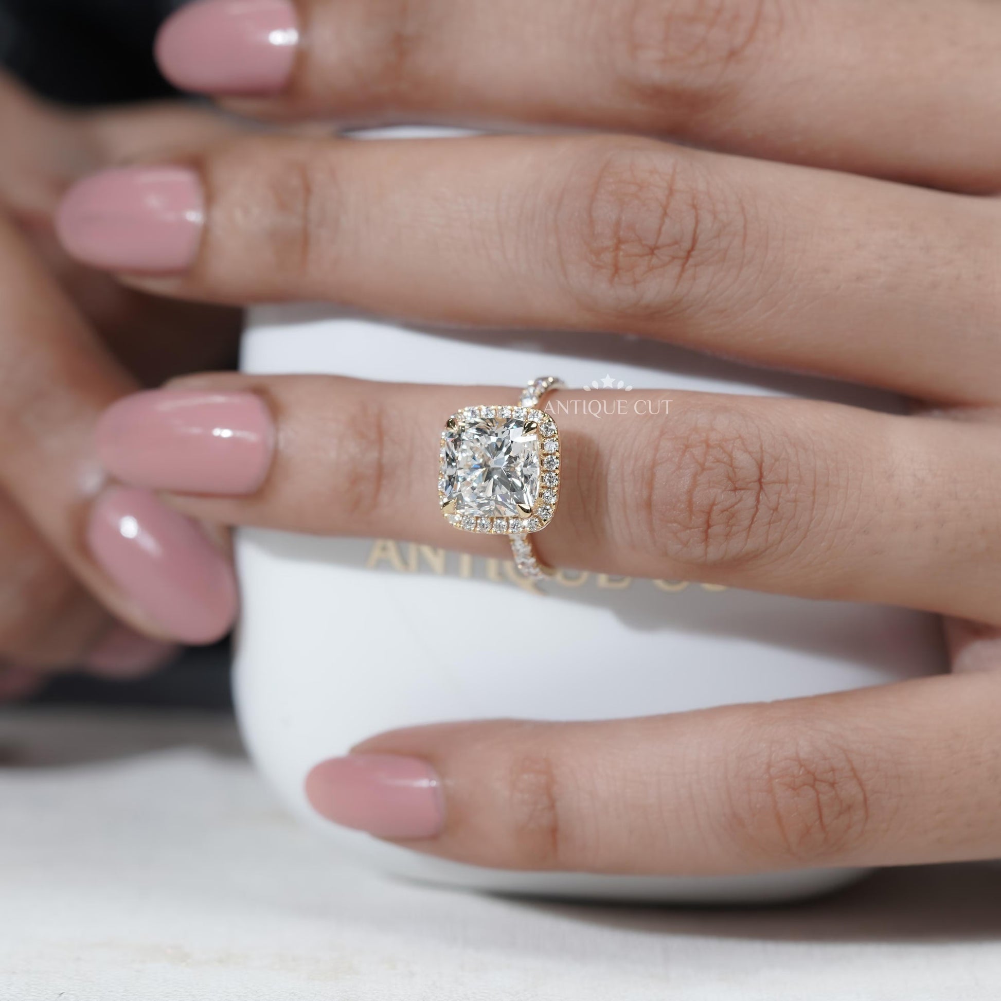 Yellow gold cushion halo diamond ring top view