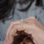 Elegant cushion halo engagement ring with yellow gold band