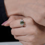 Antique style emerald cut light green diamond ring