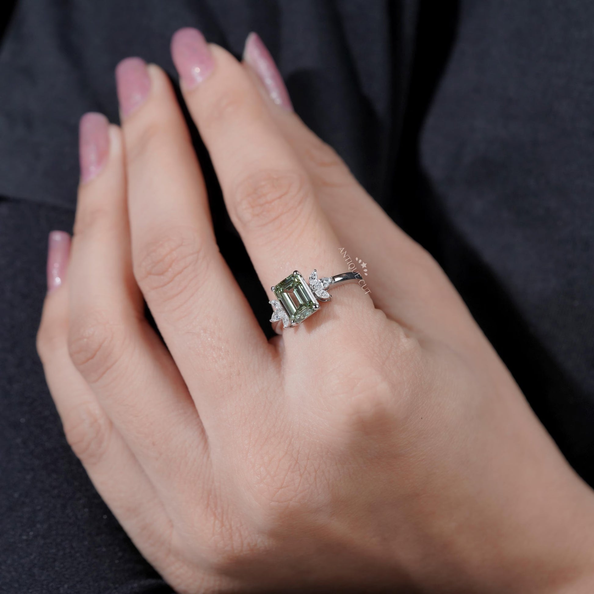 Vintage inspired emerald cut green diamond ring