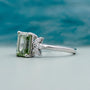 Lab grown emerald cut light green engagement ring