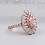 Teardrop halo ring with sparkling diamonds