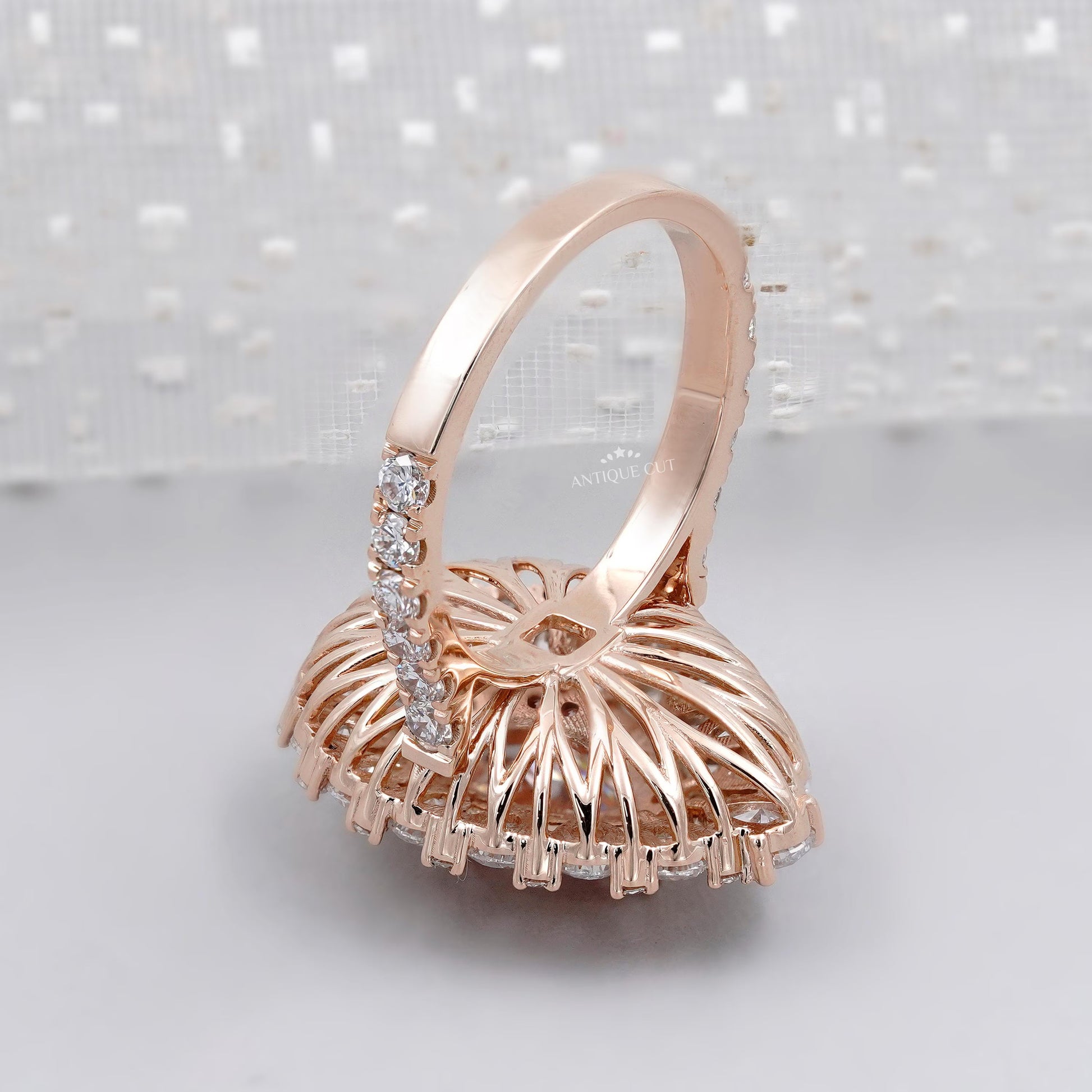Lab grown pear pink diamond halo ring rose gold