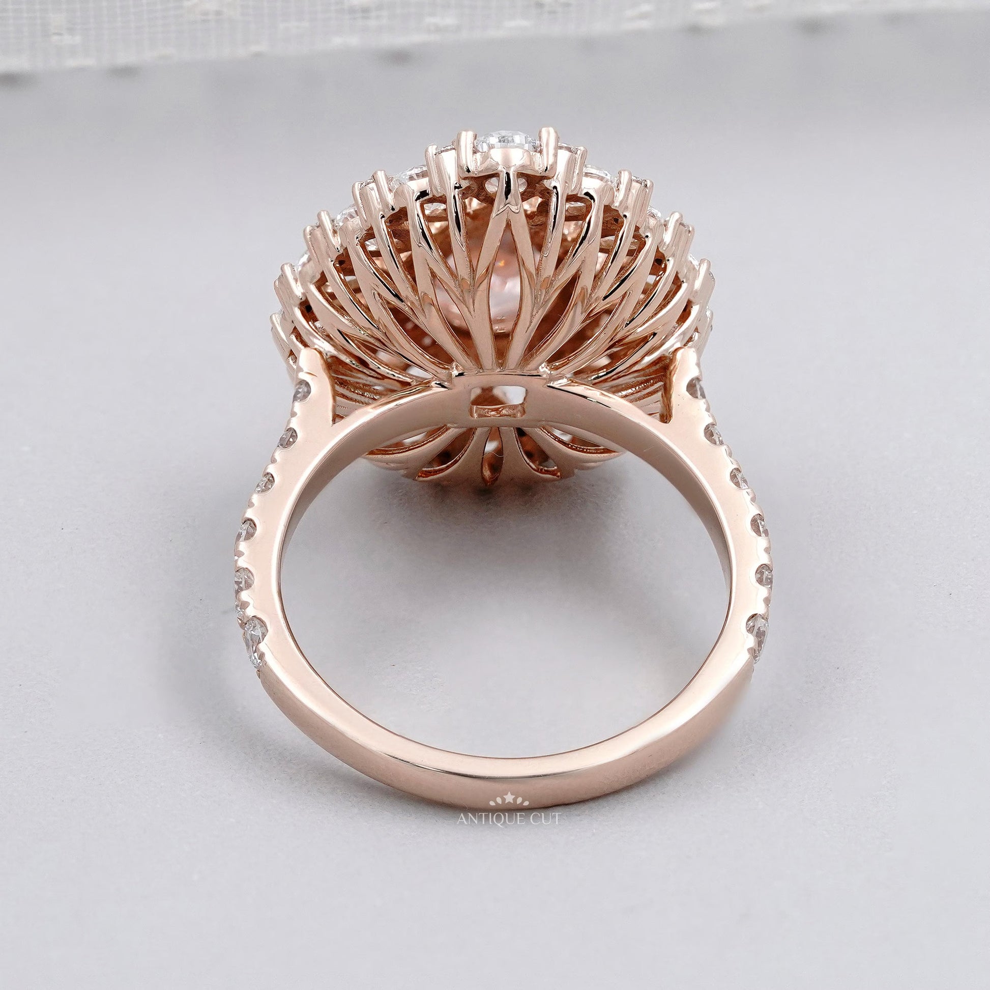 Antique cut rose gold pink diamond pear halo ring