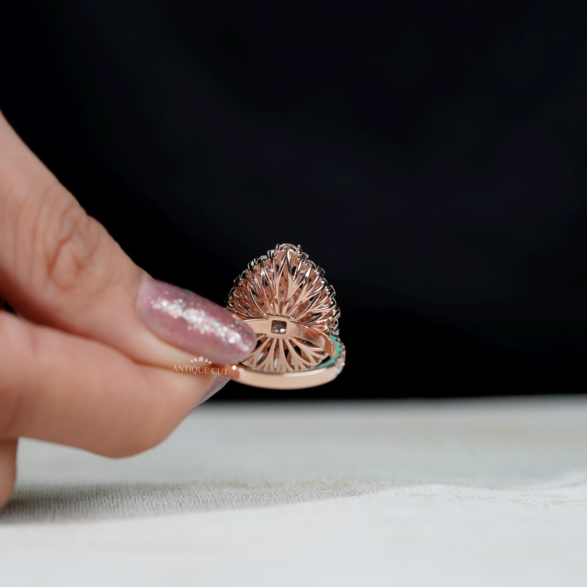Rose gold halo pink pear diamond engagement ring