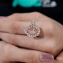 Vintage inspired rose gold pear pink diamond halo ring