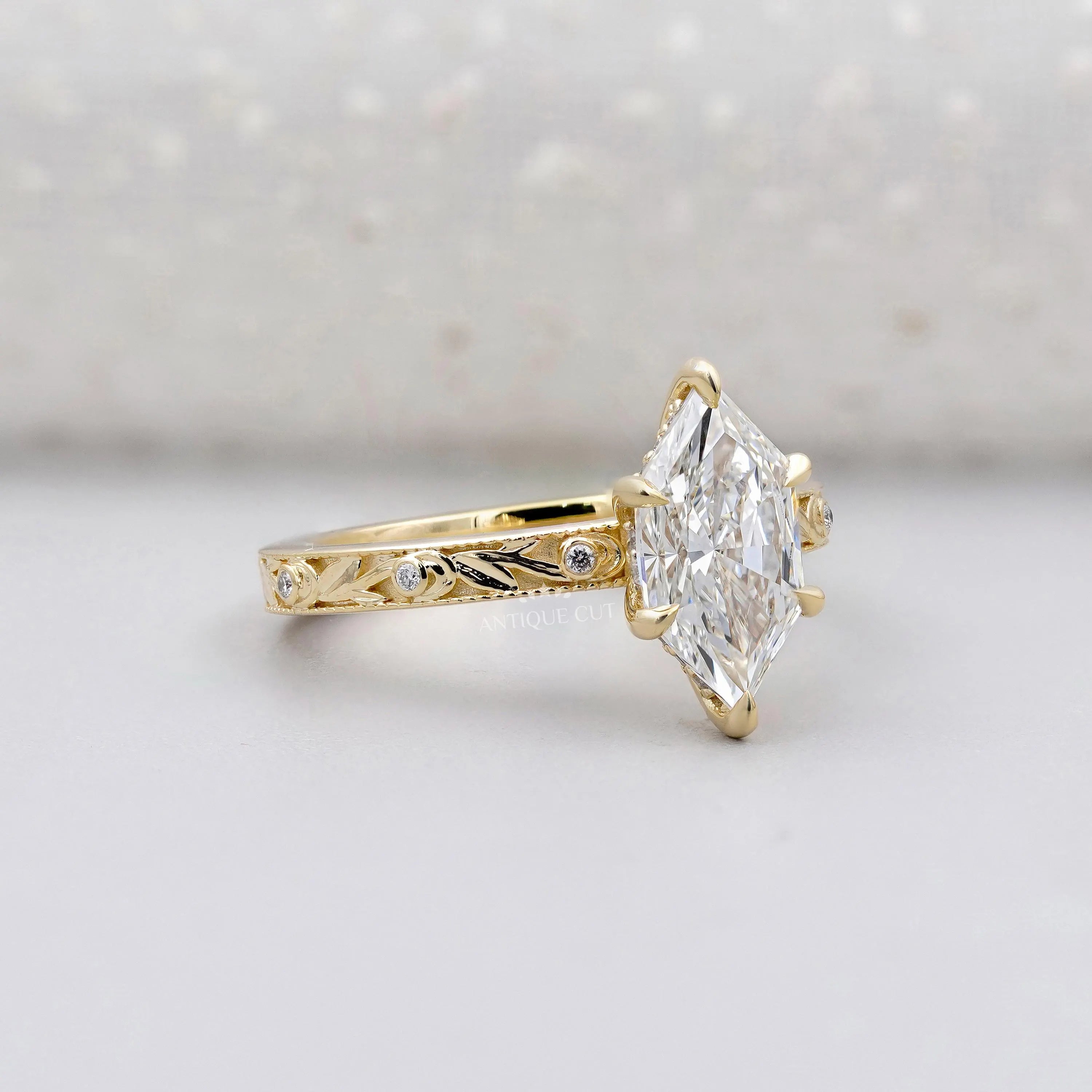 Hexagon cut diamond engagement ring with vintage inspired design
