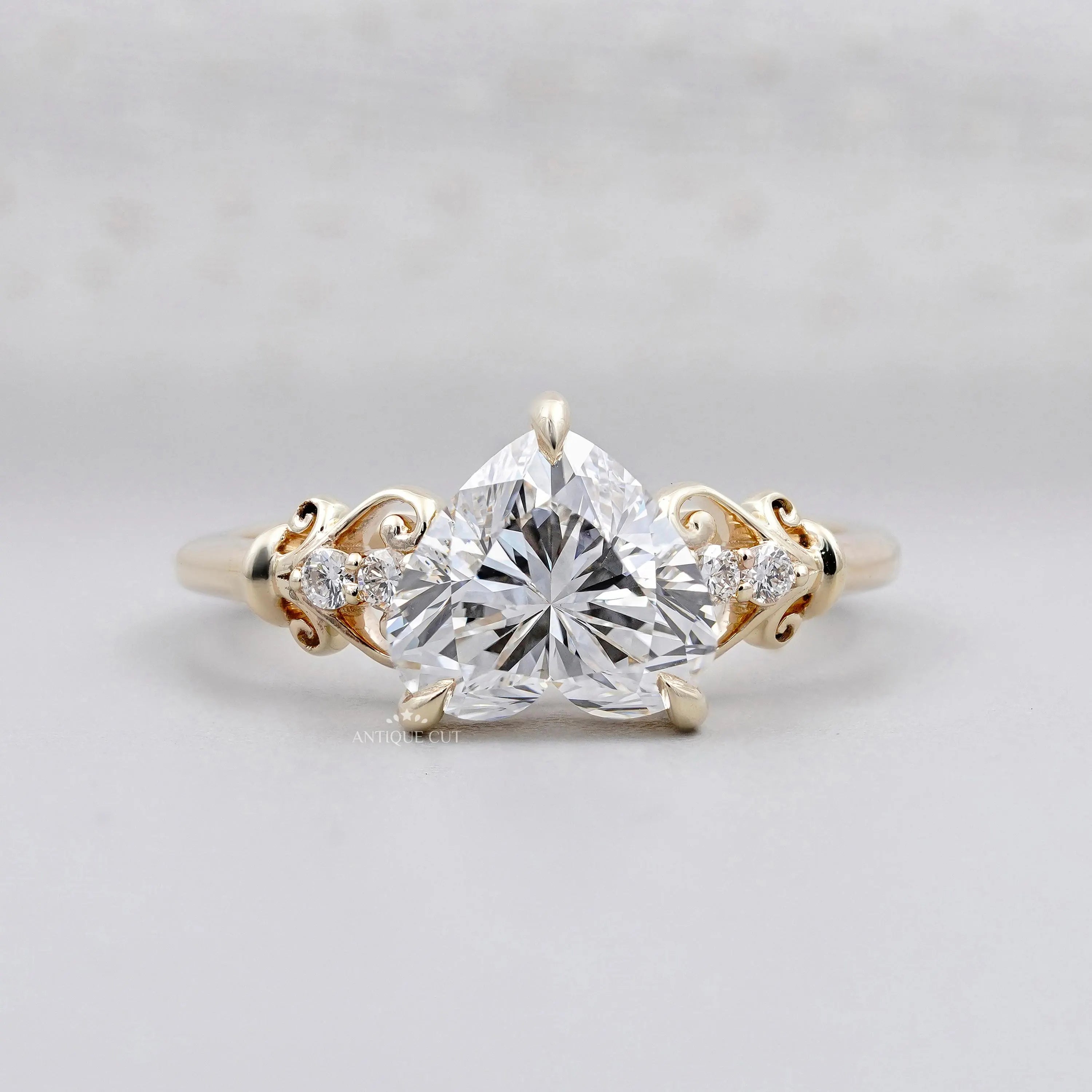 Vintage heart shaped diamond ring in yellow gold.