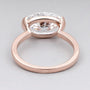 Oval cut diamond ring with half bezel setting