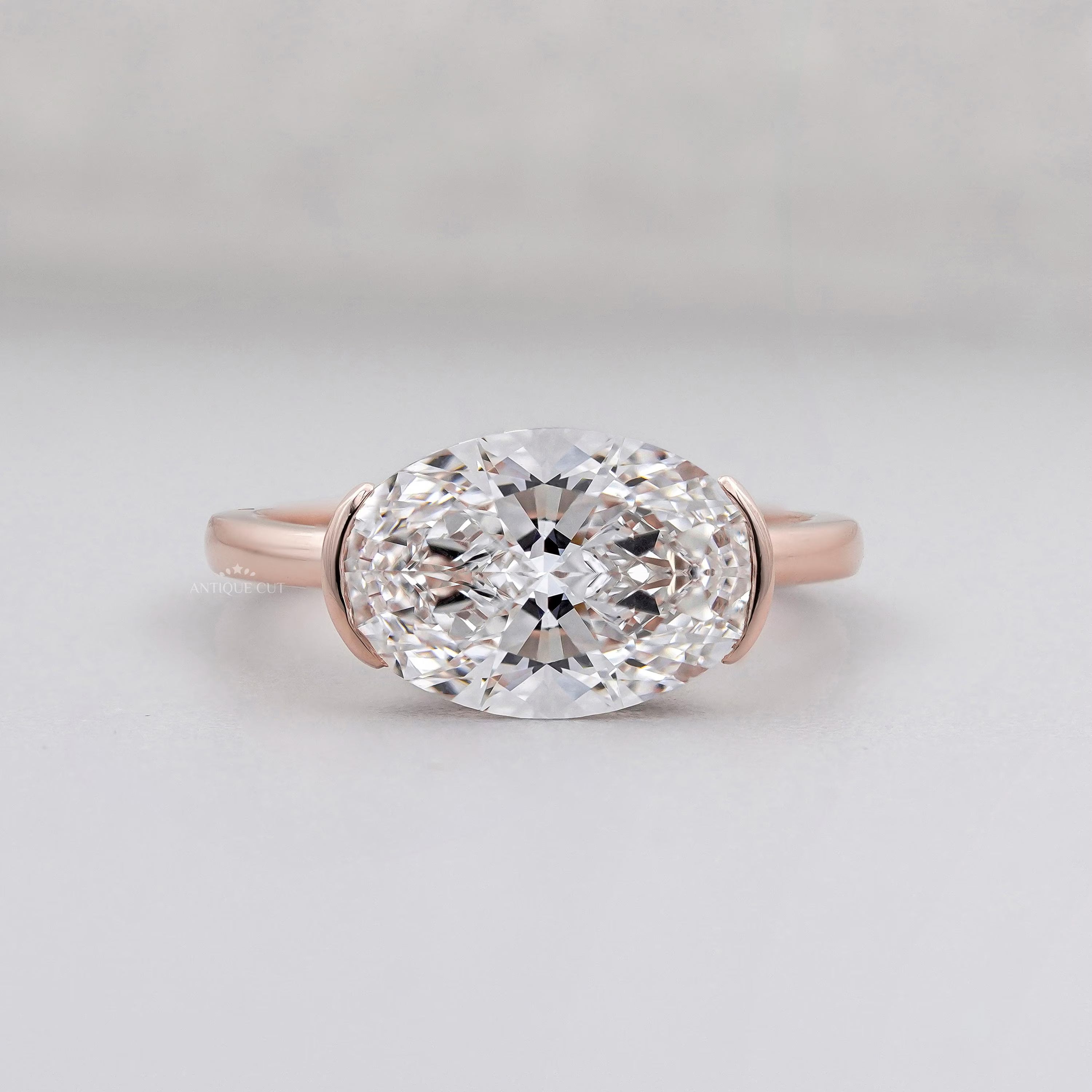 Oval East West Engagement Ring With Half Bezel Set Lab Grown Diamond Ring IGI Certified