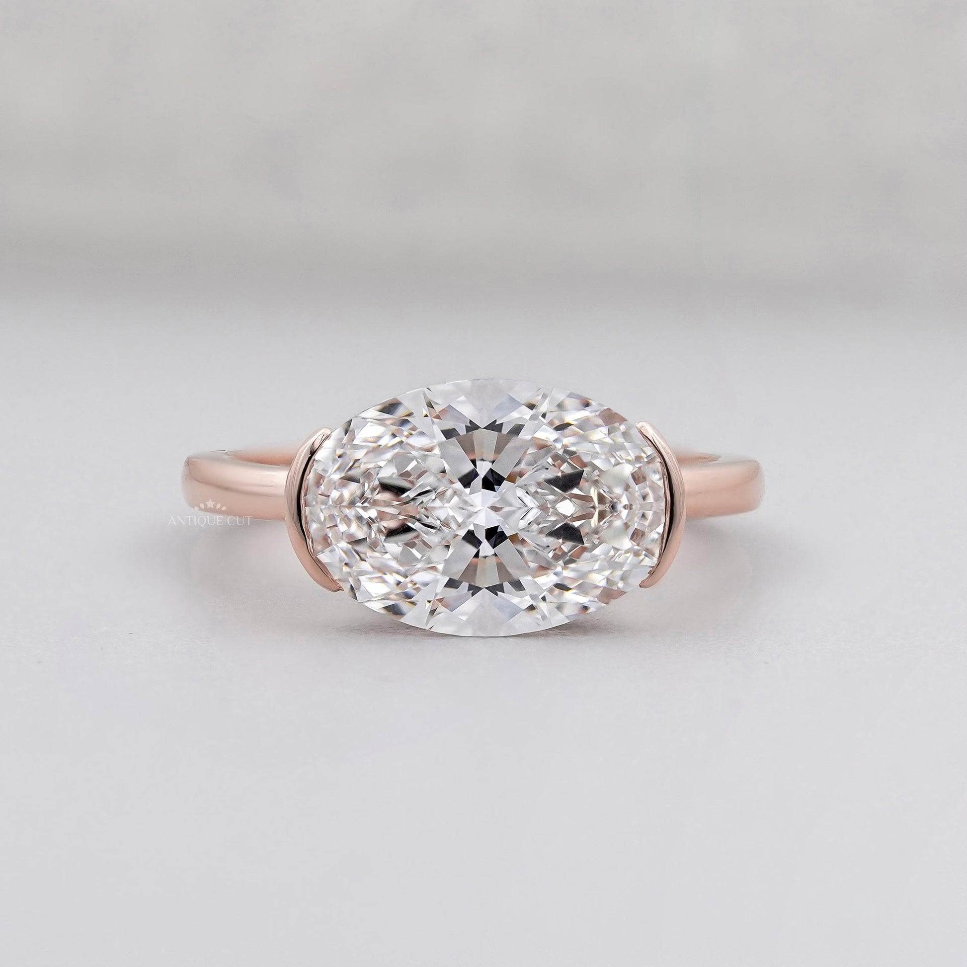 Oval East West Engagement Ring With Half Bezel Set Lab Grown Diamond Ring IGI Certified