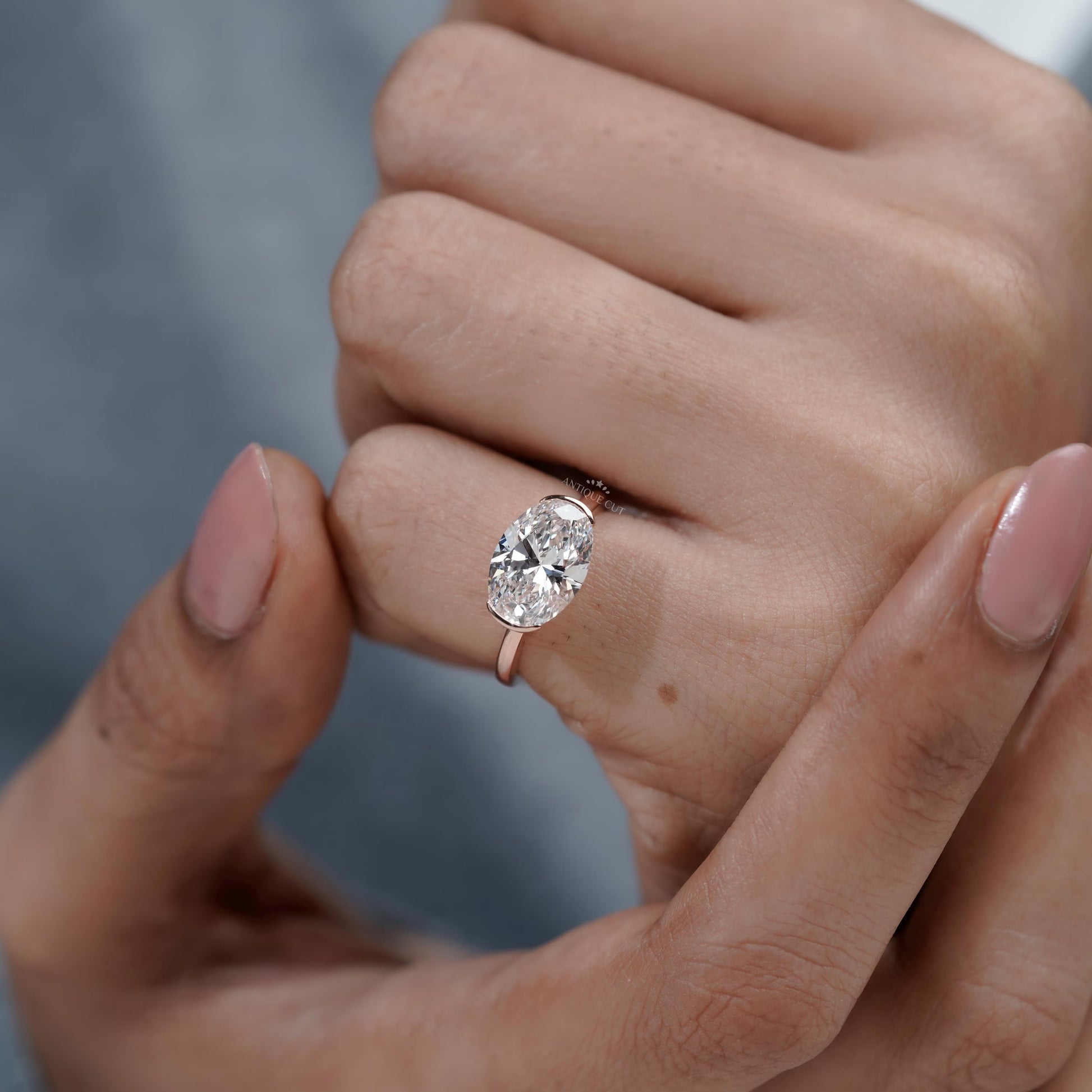 3.00TCW Oval Diamond Half Bezel Set Rose Gold Engagement Ring